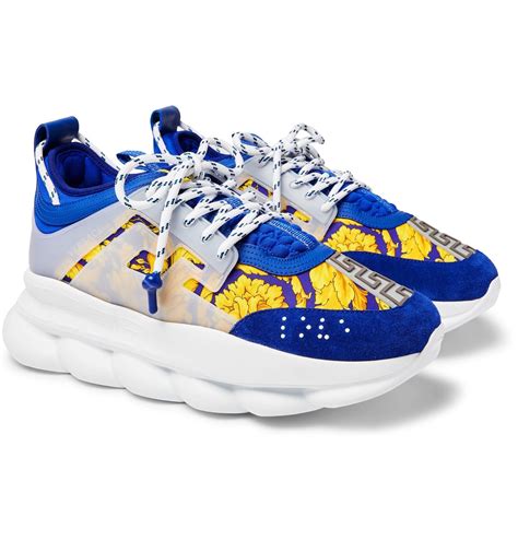 blue white and black versace sneakers with head on side|Versace white sneakers women.